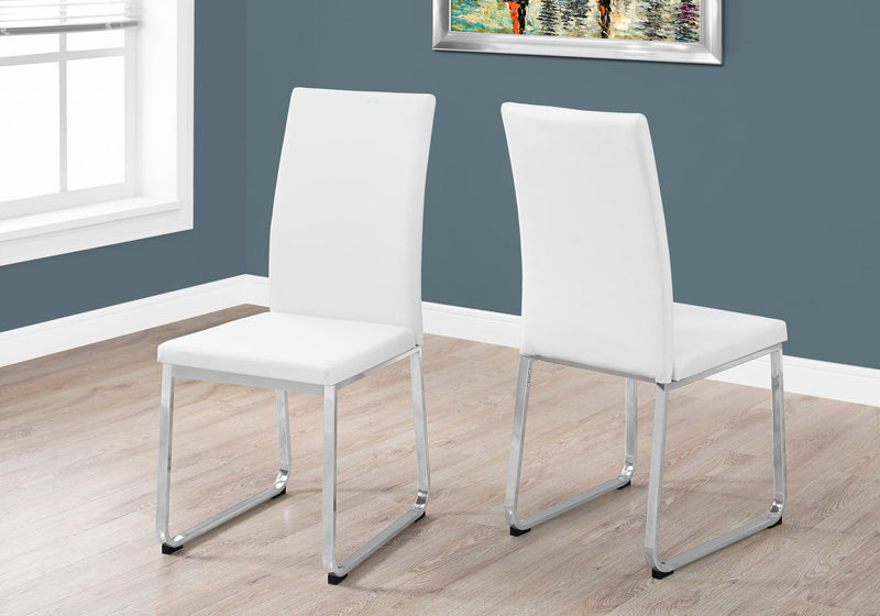 White faux leather dining online chairs with chrome legs